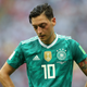 Illustration for article titled Bayern Munich President Brutally And Inexplicably Owns Mesut Özil